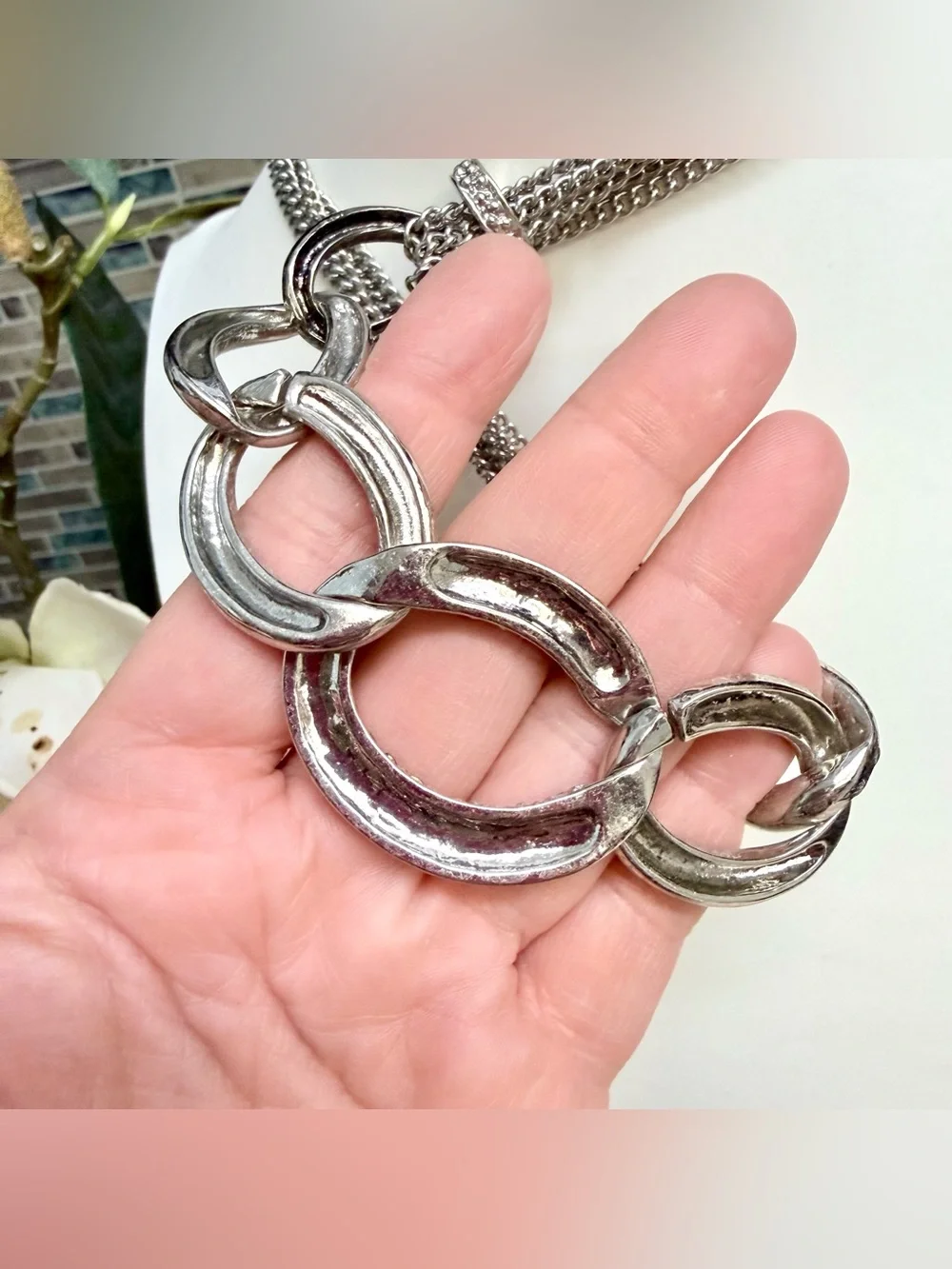Chico’s bold silver tone statement necklace